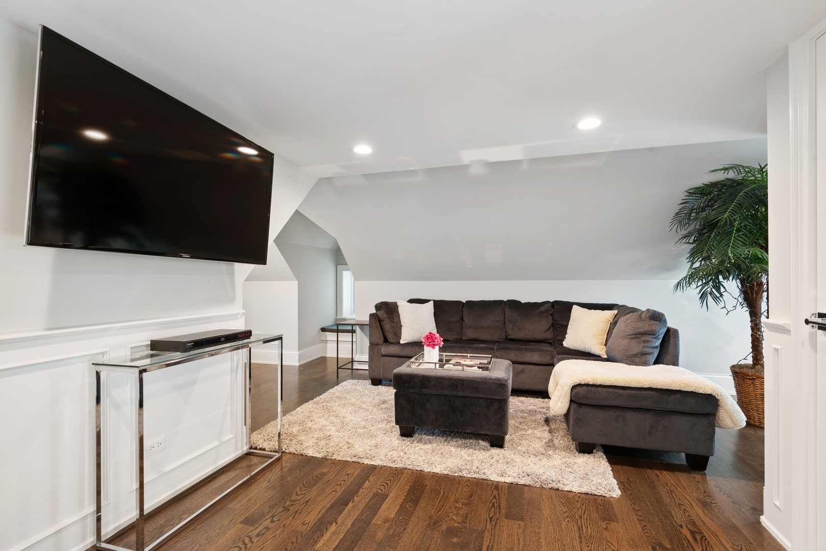 Undisclosed Address Wilmette, IL 60091 - Photo 39 of 66 a living room with furniture and a flat screen tv
