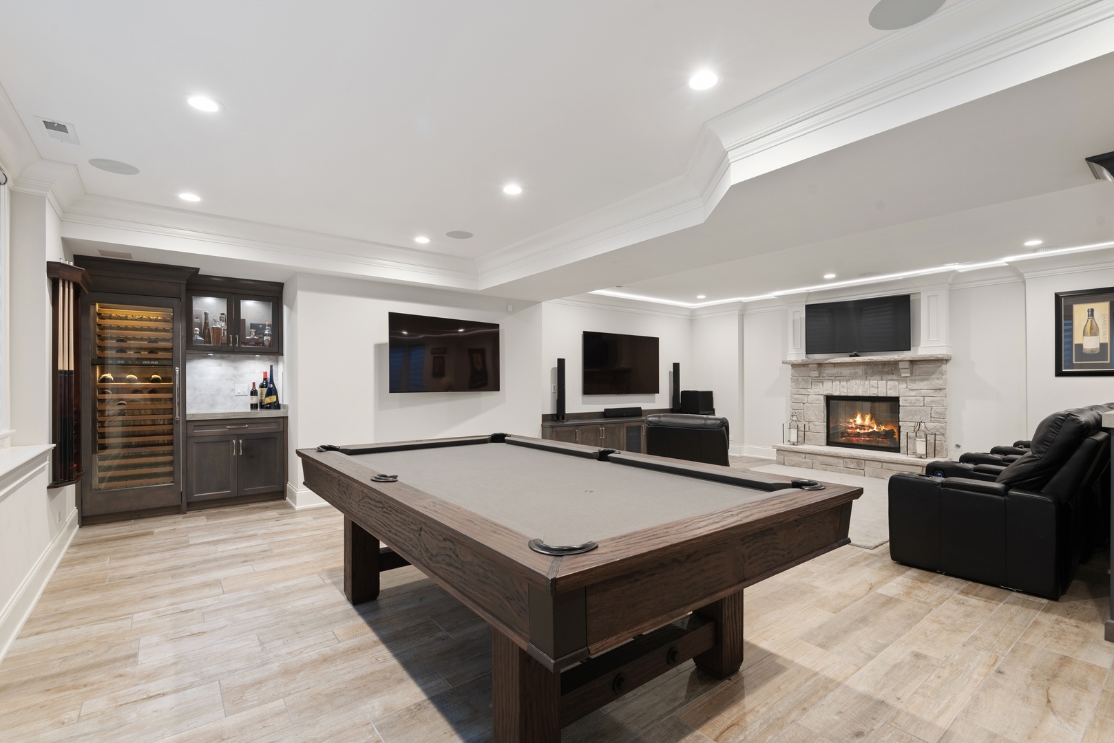 Undisclosed Address Wilmette, IL 60091 - Photo 45 of 66 a living room with furniture a flat screen tv and a kitchen view