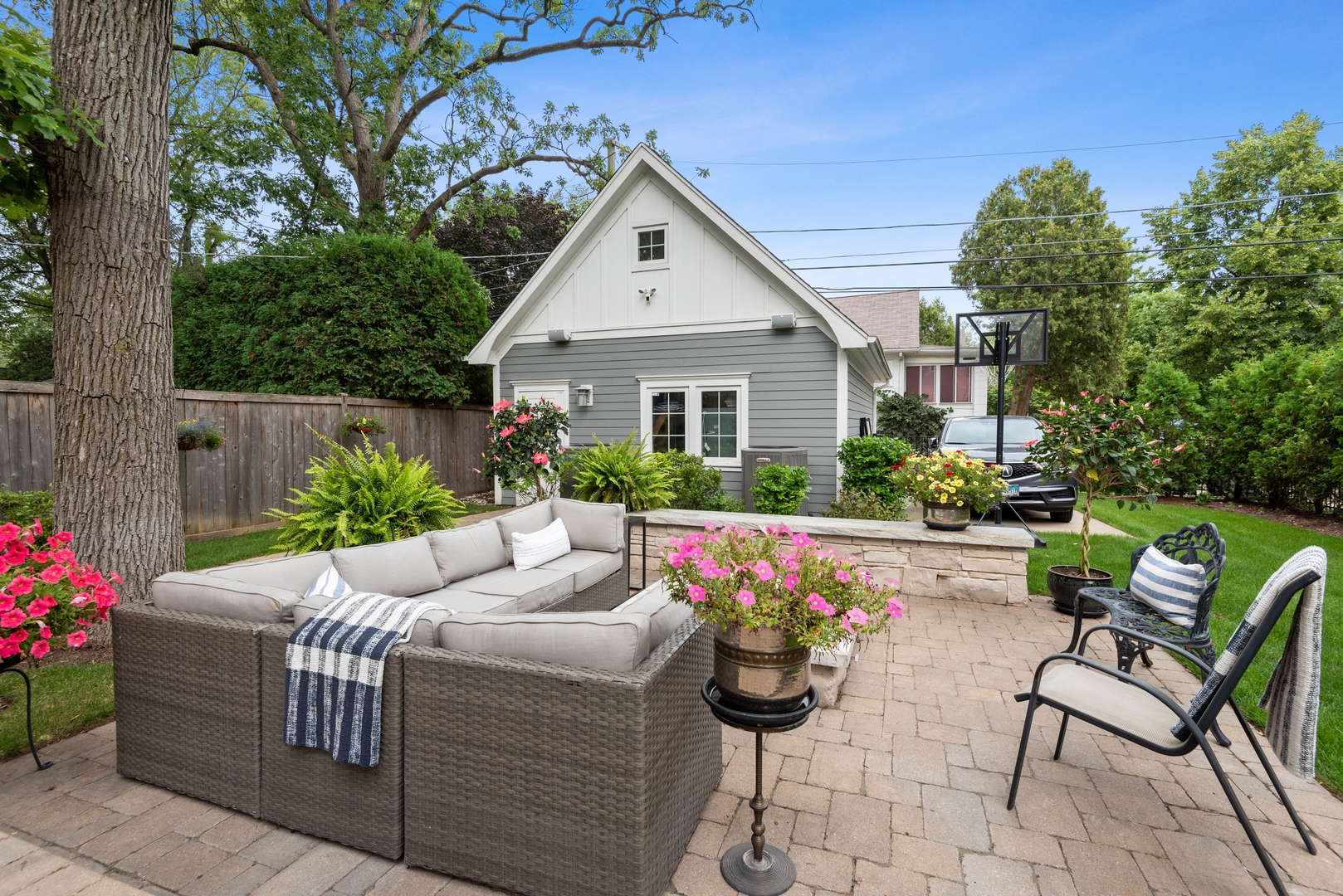 Undisclosed Address Wilmette, IL 60091 - Photo 57 of 66 a view of a patio with couches table and chairs and potted plants