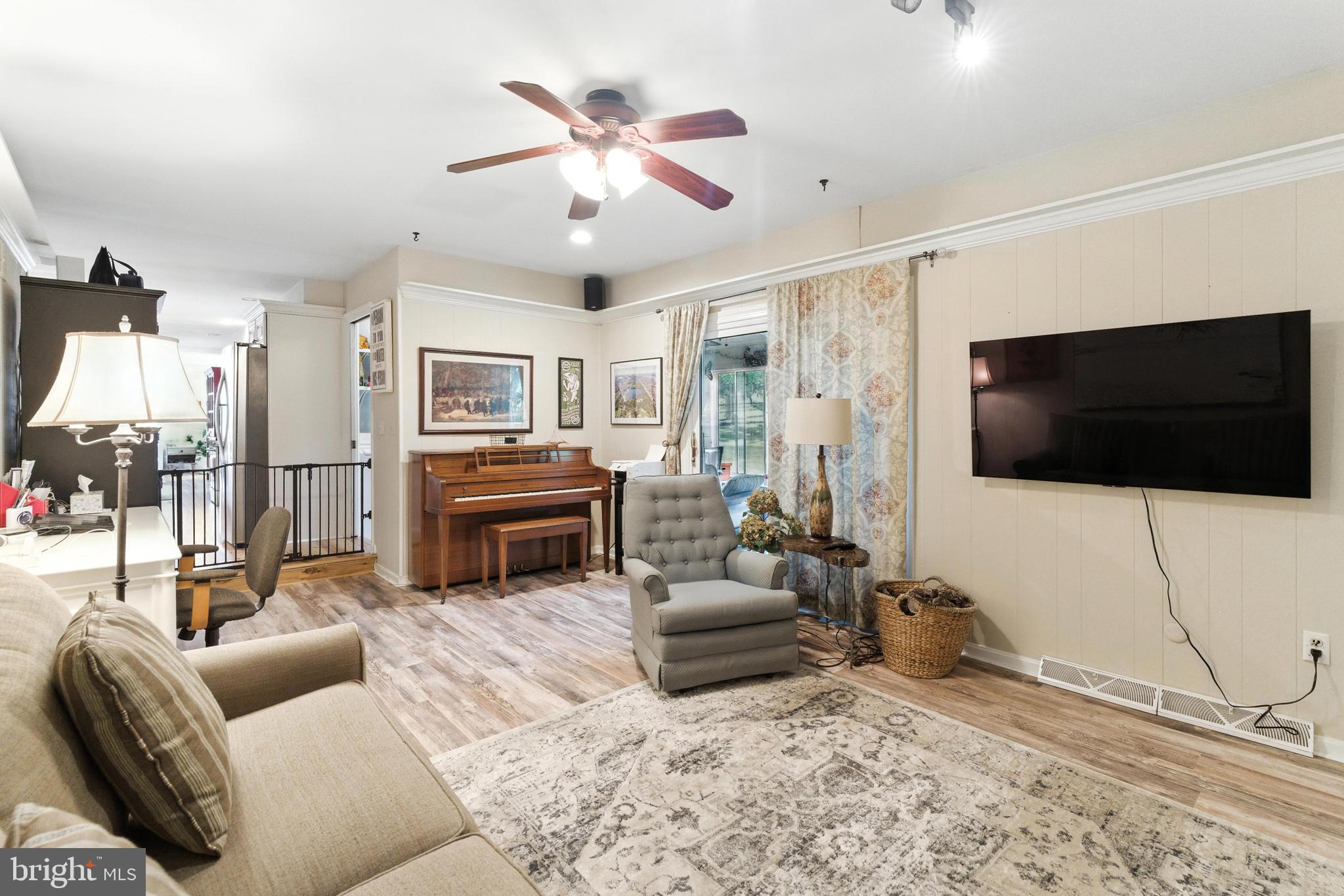 4 Robin Road Exton, PA 19341 - Photo 18 of 45 a living room with furniture and a flat screen tv