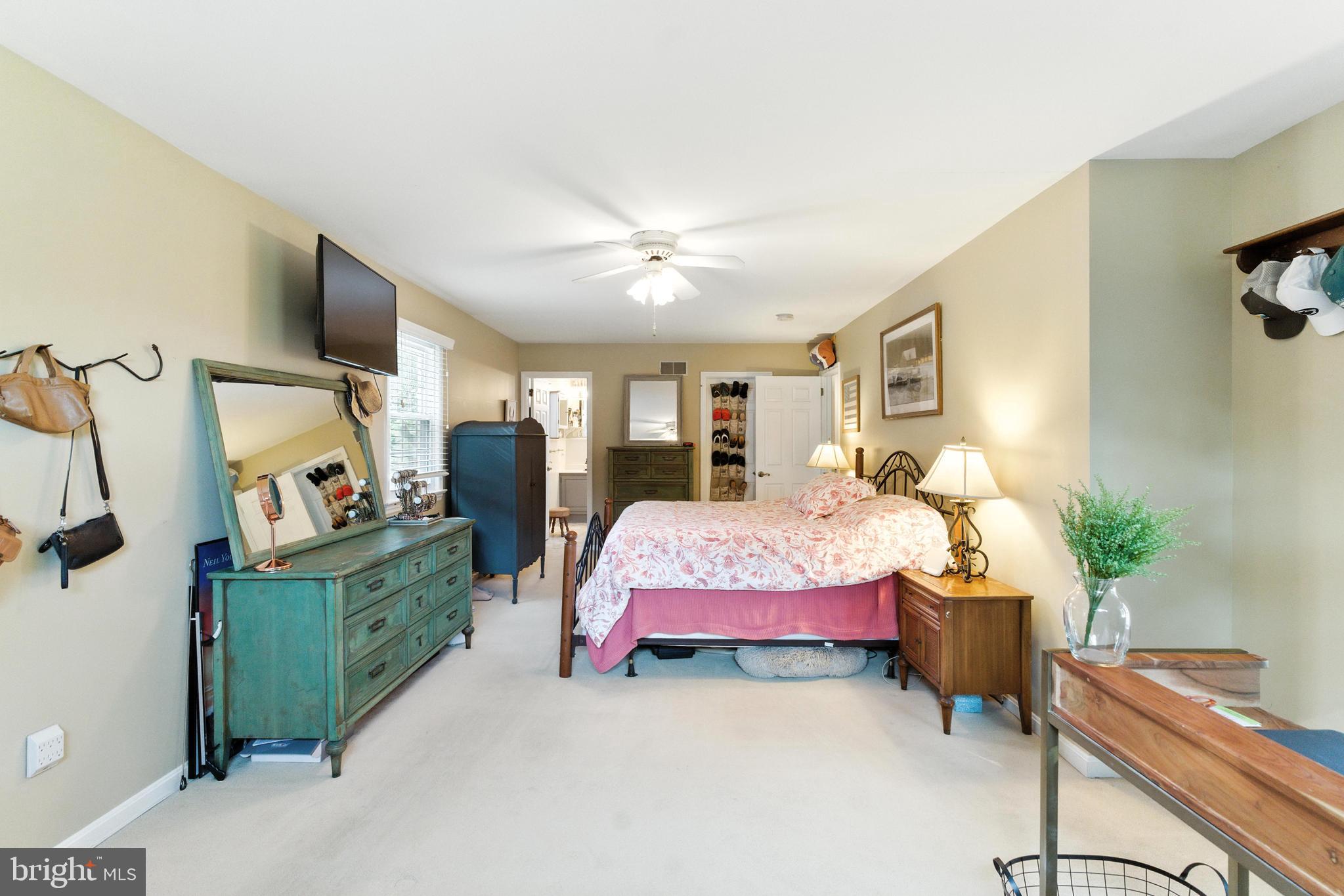 4 Robin Road Exton, PA 19341 - Photo 34 of 45 a bedroom with furniture and a flat screen tv