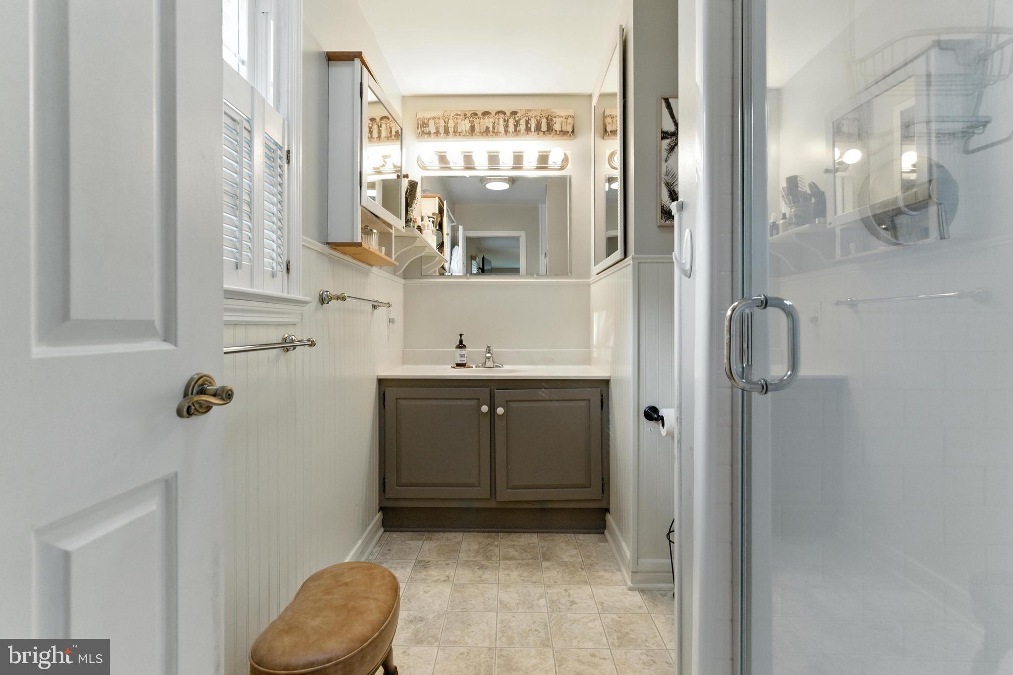 4 Robin Road Exton, PA 19341 - Photo 38 of 45 a bathroom with a sink a toilet and shower