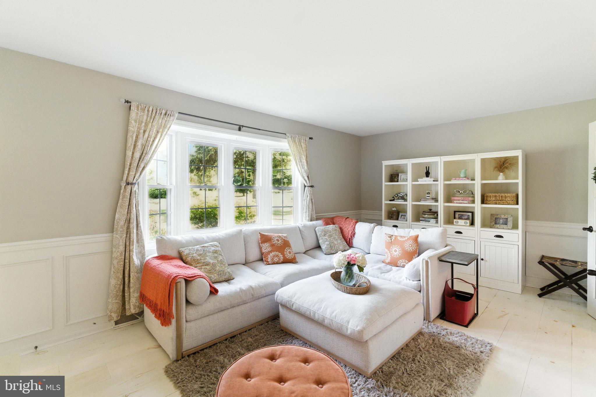 4 Robin Road Exton, PA 19341 - Photo 7 of 45 a living room with furniture and a window