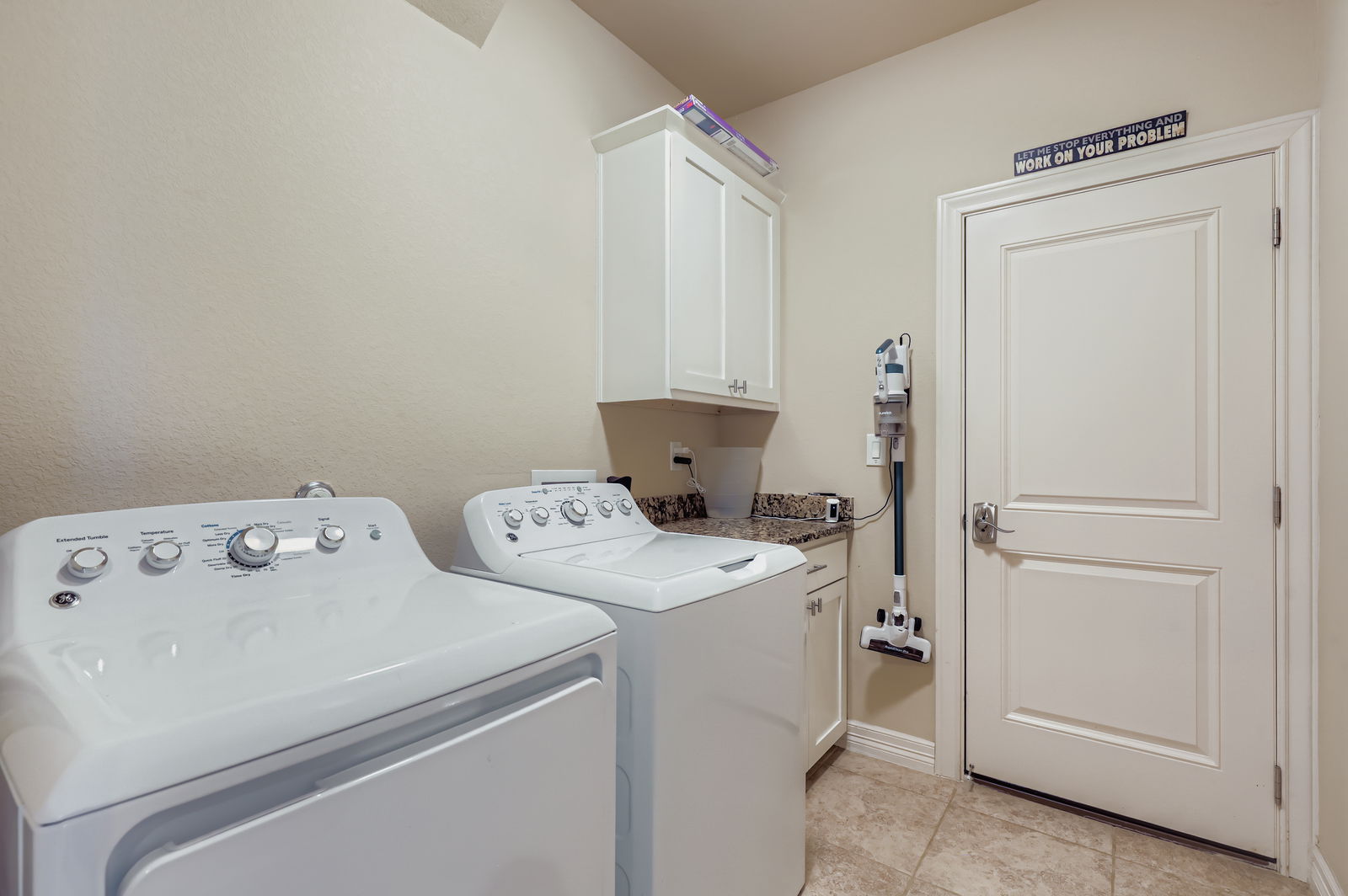 19004 Mariners Point Point Venture, TX 78645 - Photo 15 of 23 Main floor laundry room