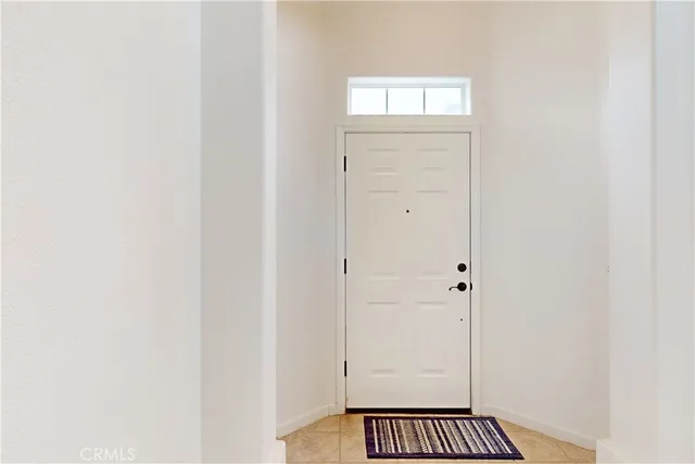 a bedroom with furniture and a bed