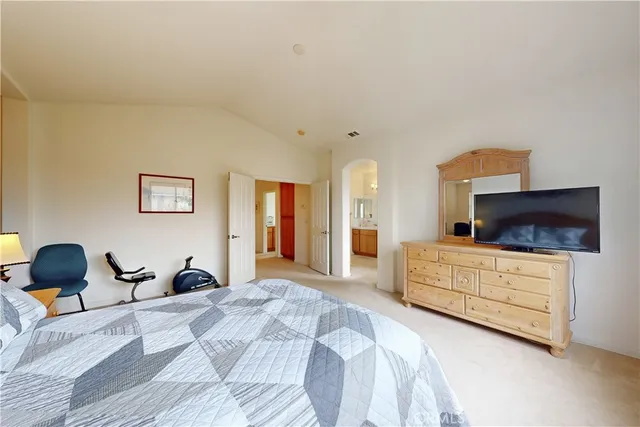 a bathroom with a tub a sink and a window