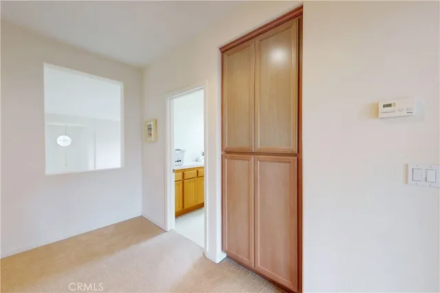 a bedroom with a workspace