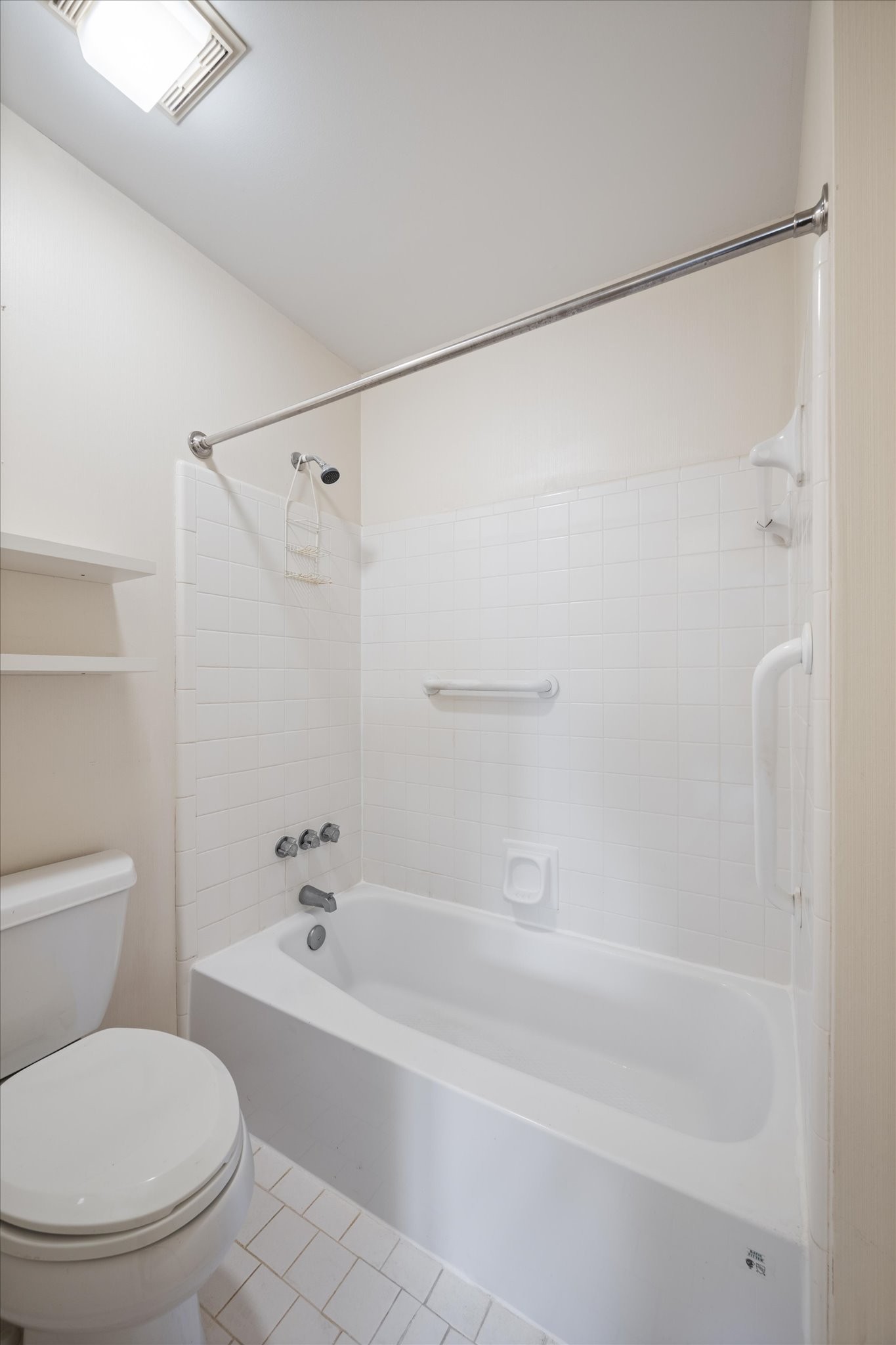 768 Kent Road Nashville, TN 37214 - Photo 16 of 20 a bathroom with a toilet and a bathtub