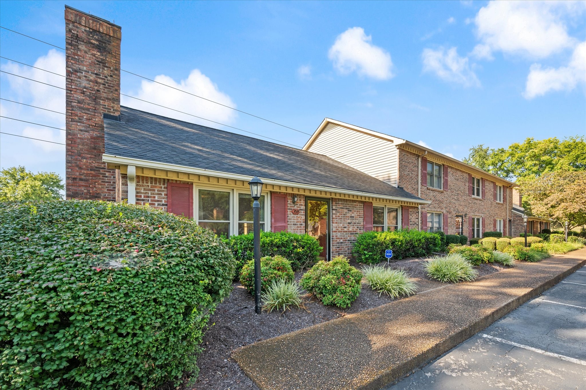 768 Kent Road Nashville, TN 37214 - Photo 2 of 20 a view of a building next to a yard