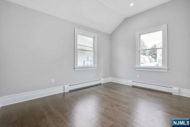26 Bogert Street Closter, NJ 07624 - Photo 11 of 18 an empty room with wooden floor and windows