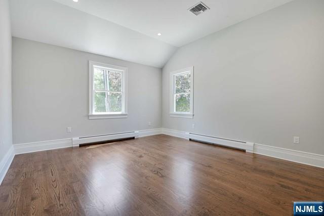 26 Bogert Street Closter, NJ 07624 - Photo 16 of 18 an empty room with wooden floor and windows
