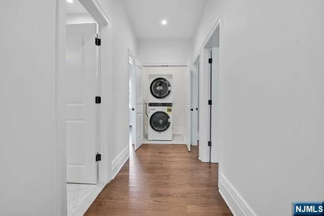 a view of entryway with wooden floor