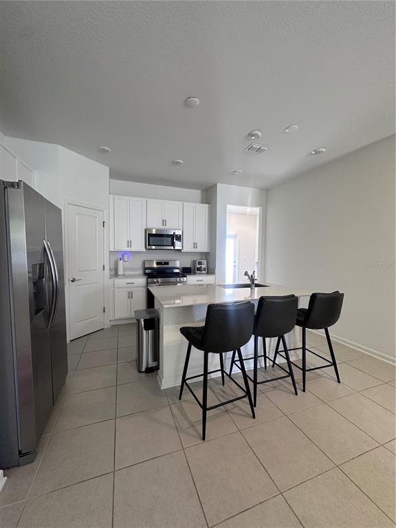 1868 Bright Sky Drive Kissimmee, FL 34744 - Photo 4 of 35