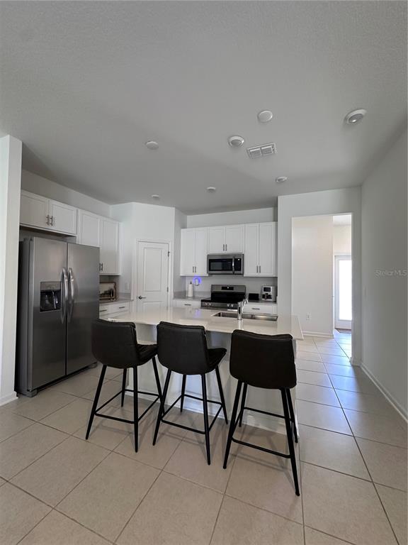 1868 Bright Sky Drive Kissimmee, FL 34744 - Photo 5 of 35