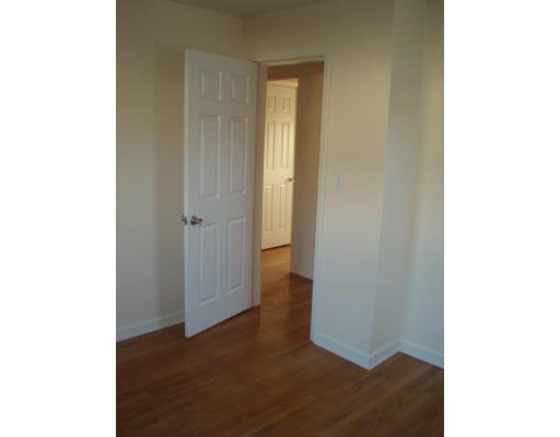 267 Abbott Street Springfield, MA 01118 - Photo 11 of 25 a view of an empty room with wooden floor