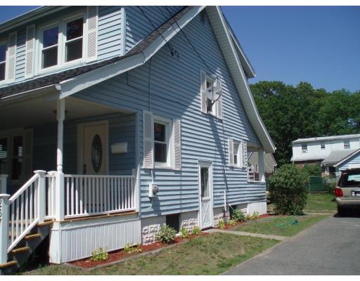 267 Abbott Street Springfield, MA 01118 - Photo 3 of 25 a view of a house with a yard and deck