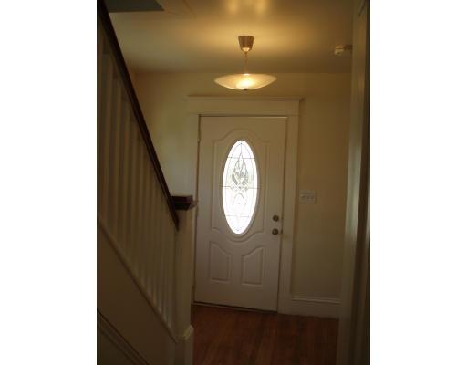 267 Abbott Street Springfield, MA 01118 - Photo 5 of 25 a view of a hallway with windows