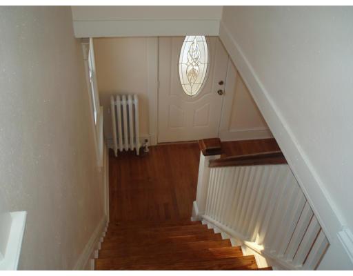 267 Abbott Street Springfield, MA 01118 - Photo 6 of 25 a view of staircase with wooden floor