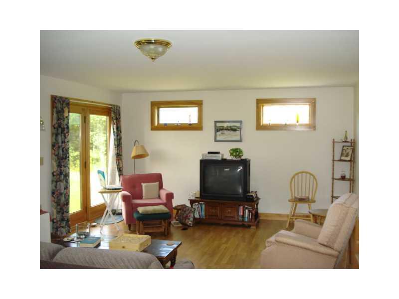 141 Halls Corner Road Belmont, ME 04952 - Photo 18 of 35 Family Room. This family or living...