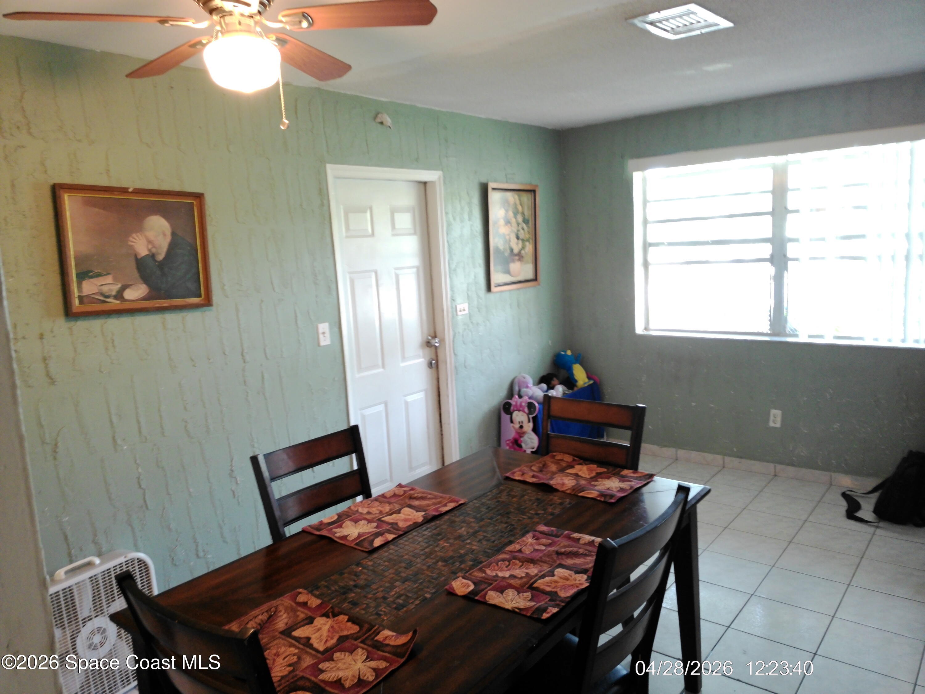 11412 Southwest 41st Street Miami, FL 33165 - Photo 13 of 35 Side door to car port