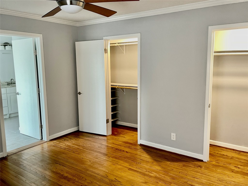 6674 Sylvan Road Houston, TX 77023 - Photo 15 of 16 an empty room with wooden floor and closet