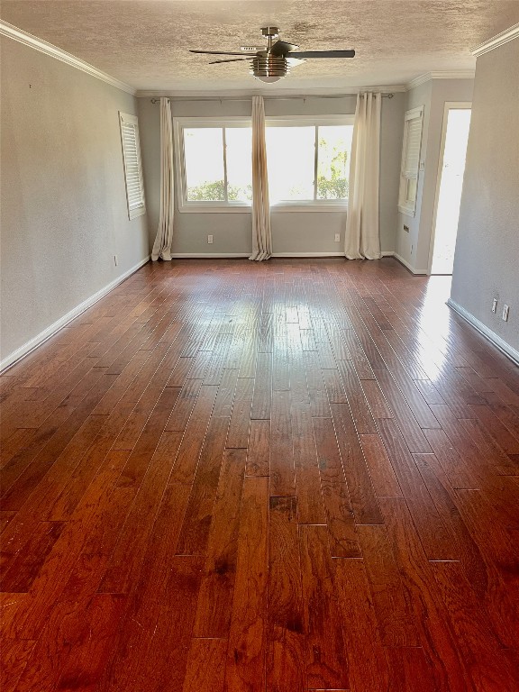 6674 Sylvan Road Houston, TX 77023 - Photo 3 of 16 wooden floor in an empty room with a window