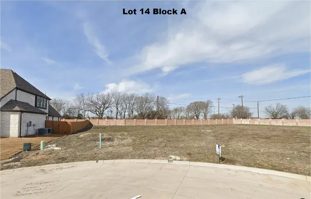 a view of a lake with a big yard