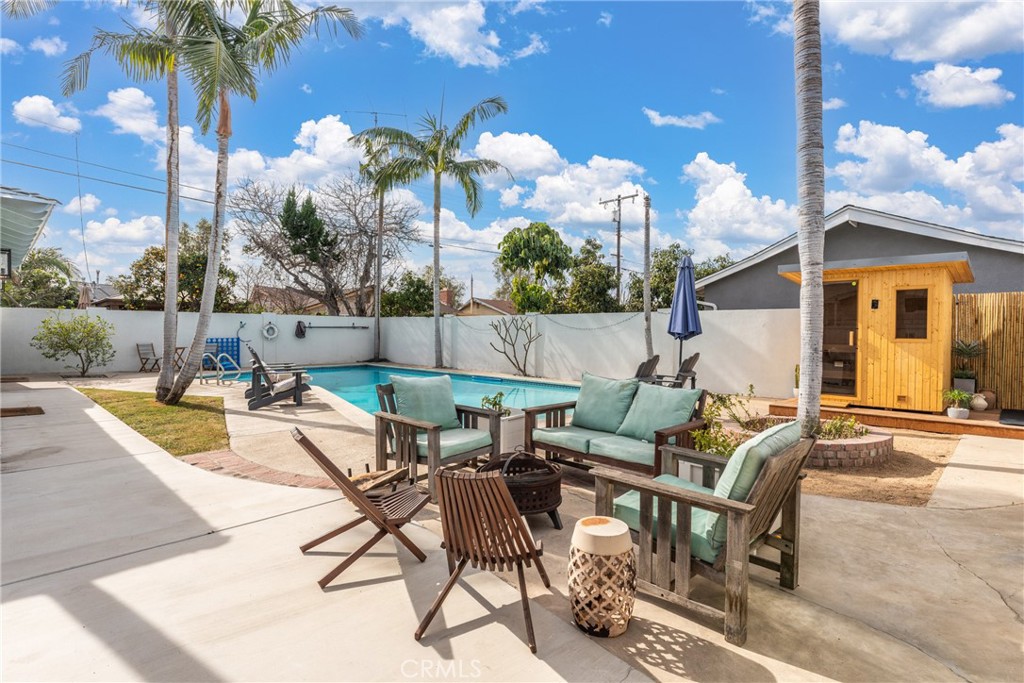 a view of a patio with swimming pool