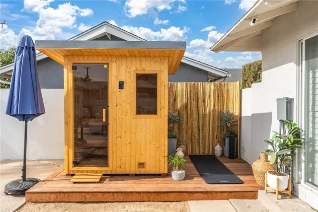 a front view of a house with a rug