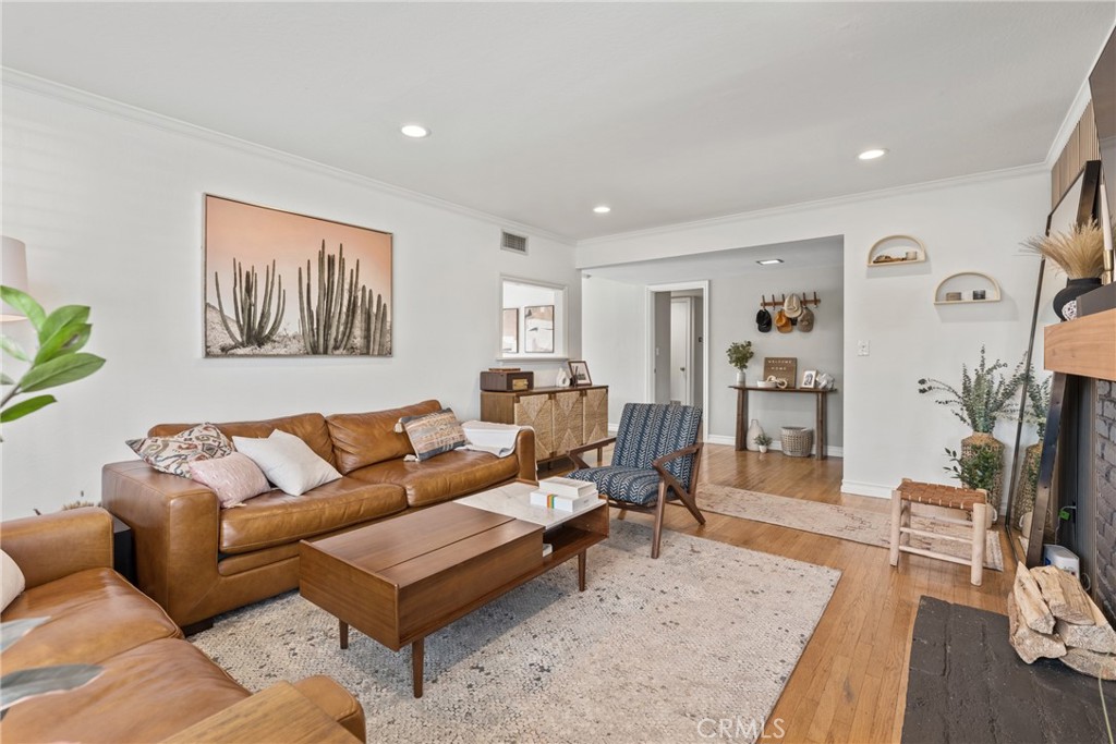 1550 West Palais Road Anaheim, CA 92802 - Photo 4 of 15 a living room with furniture and a flat screen tv