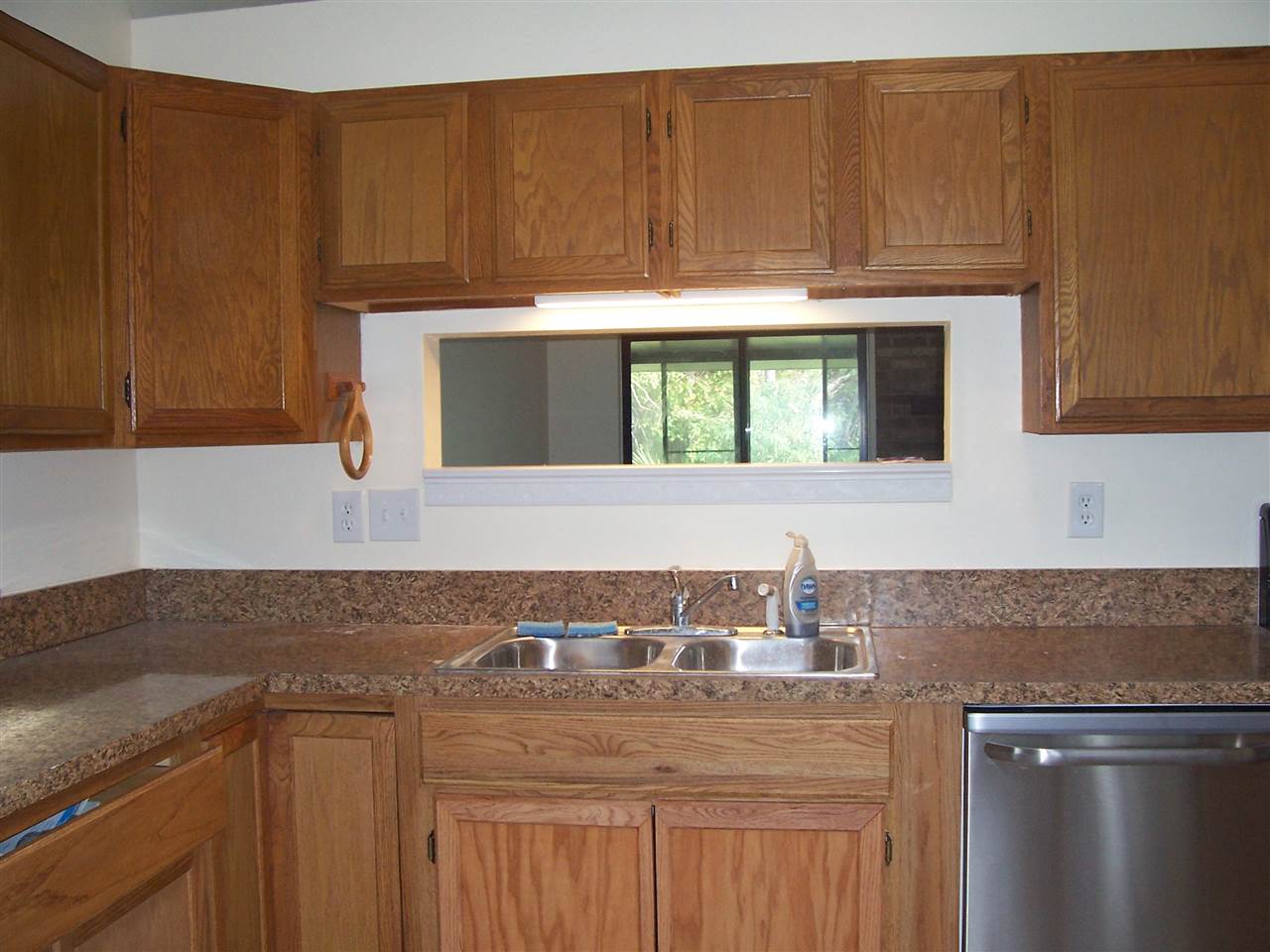 145 Cornell Road St. Augustine, FL 32086 - Photo 4 of 10 a kitchen with a sink cabinets and utility