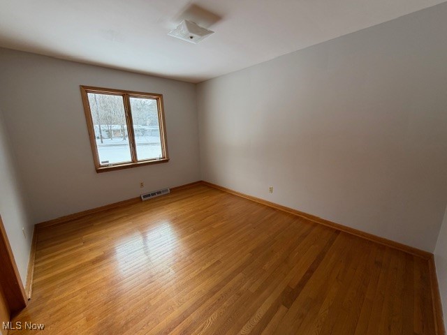 1933 Arndale Road Stow, OH 44224 - Photo 12 of 21 Empty room featuring light wood-style floors and baseboards