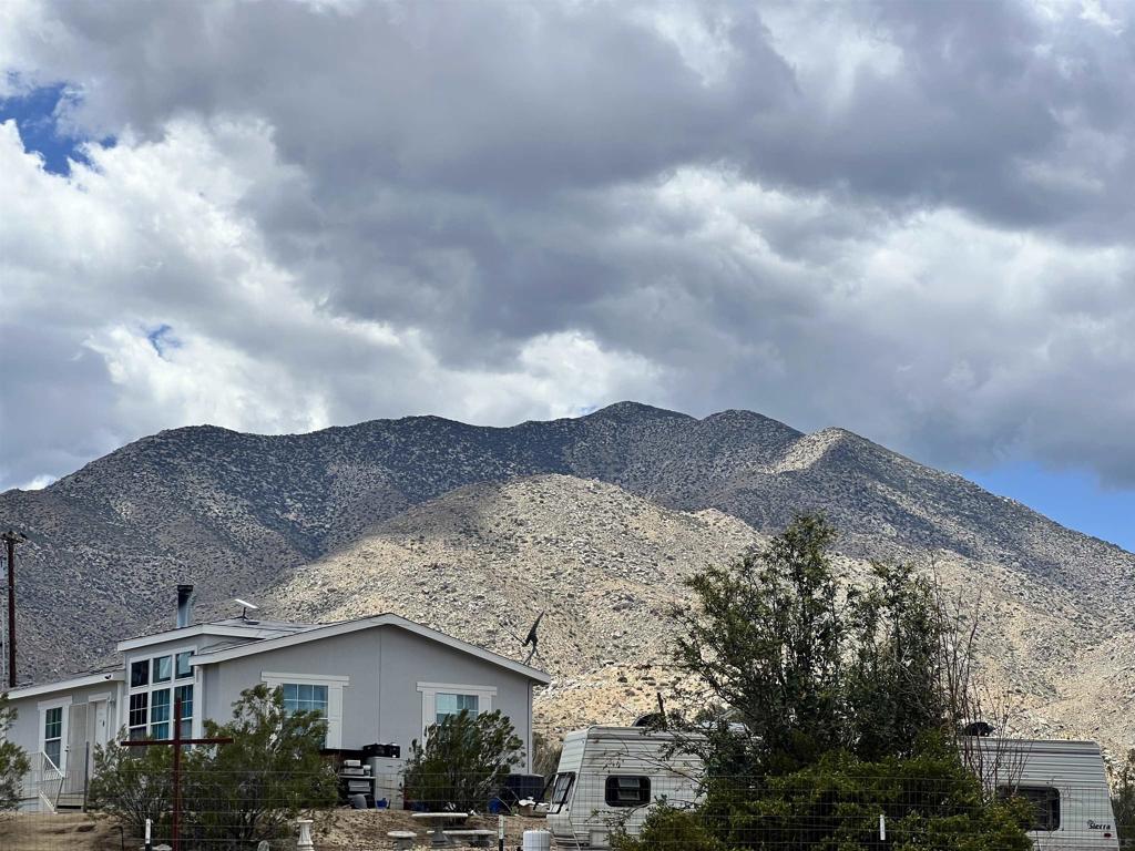 Great Overland Stage Route Julian, CA 92036 - Photo 4 of 21 a view of a house with a mountain in the background