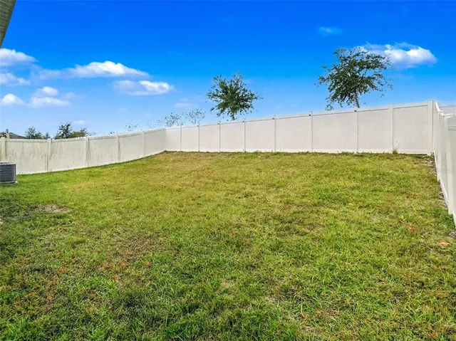a view of an outdoor space and a yard