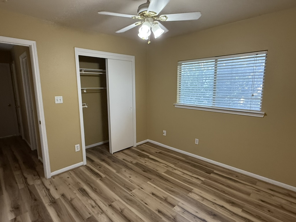 1707 Morningside Cove Round Rock, TX 78664 - Photo 17 of 31 an empty room with closet and a ceiling fan