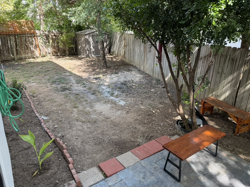 1707 Morningside Cove Round Rock, TX 78664 - Photo 18 of 31 a backyard of a house with table and chairs