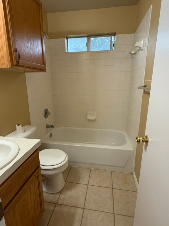 1707 Morningside Cove Round Rock, TX 78664 - Photo 24 of 31 a bathroom with a sink a mirror a toilet and bathtub