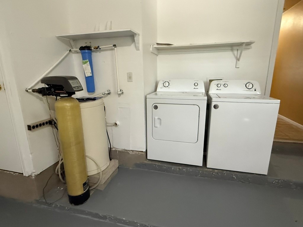 1707 Morningside Cove Round Rock, TX 78664 - Photo 26 of 31 a utility room with dryer and washer