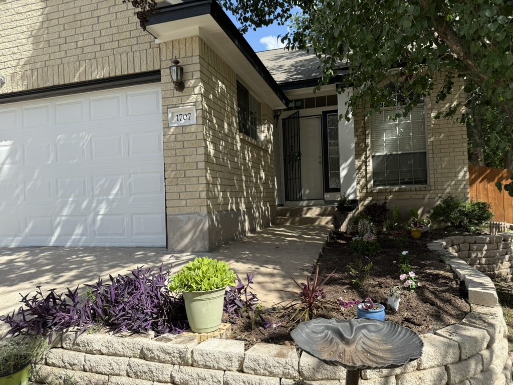 1707 Morningside Cove Round Rock, TX 78664 - Photo 6 of 31 a view of a chair and table in backyard