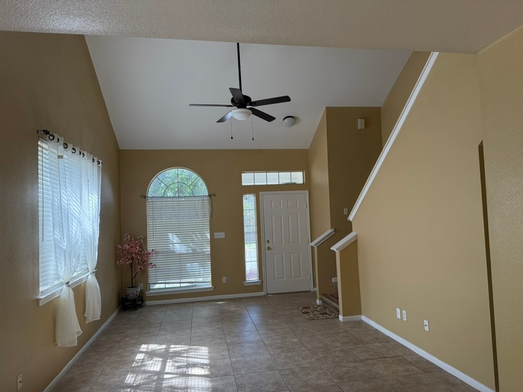 1707 Morningside Cove Round Rock, TX 78664 - Photo 10 of 31 wooden floor in an empty room with a window