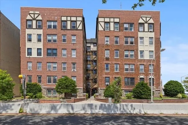 a view of a building with a street