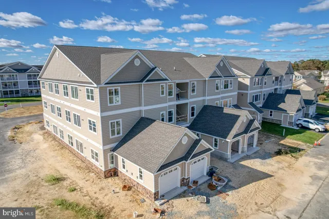 an aerial view of a house with a garden