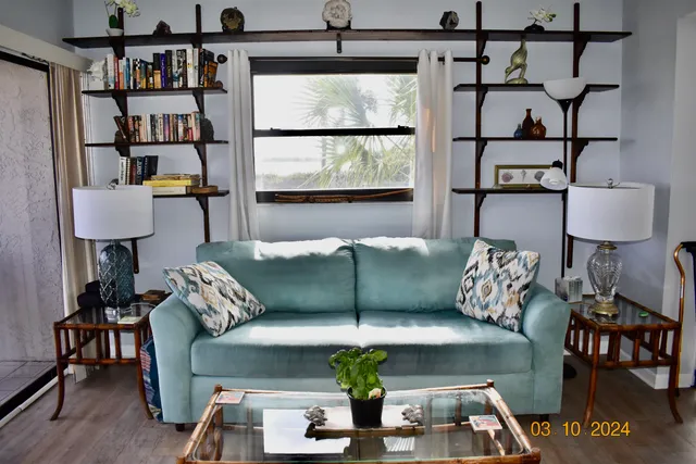 a kitchen with a refrigerator and cabinets