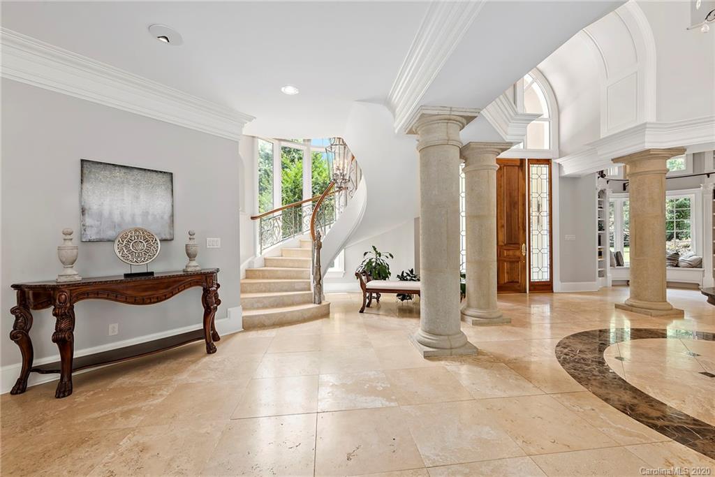 8333 Providence Road Charlotte, NC 28277 - Photo 11 of 47 a living room with furniture and a table