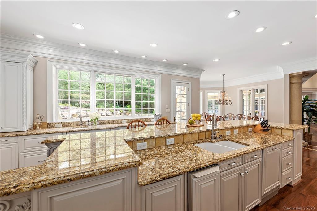 8333 Providence Road Charlotte, NC 28277 - Photo 13 of 47 a kitchen with sink stove and cabinets