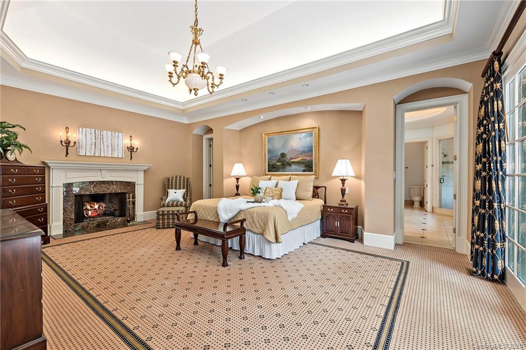 8333 Providence Road Charlotte, NC 28277 - Photo 17 of 47 a living room with furniture and a fireplace