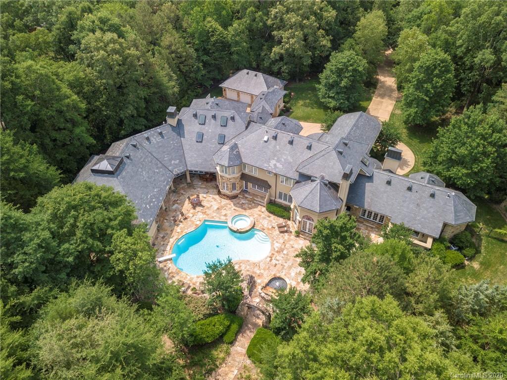 8333 Providence Road Charlotte, NC 28277 - Photo 3 of 47 an aerial view of residential house with outdoor space and swimming pool
