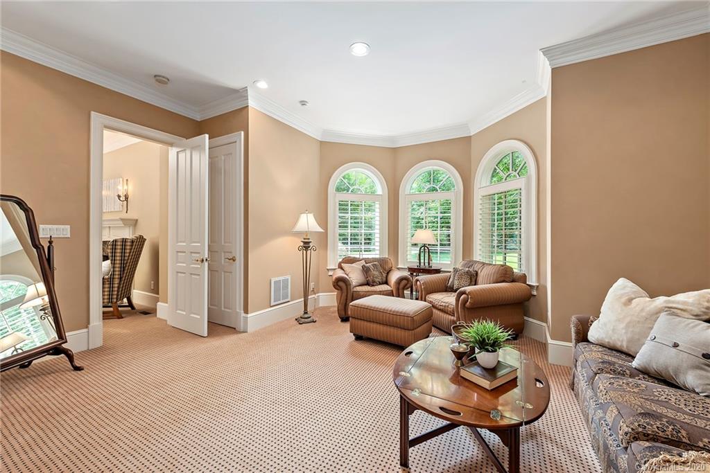 8333 Providence Road Charlotte, NC 28277 - Photo 21 of 47 a living room with furniture and a large window