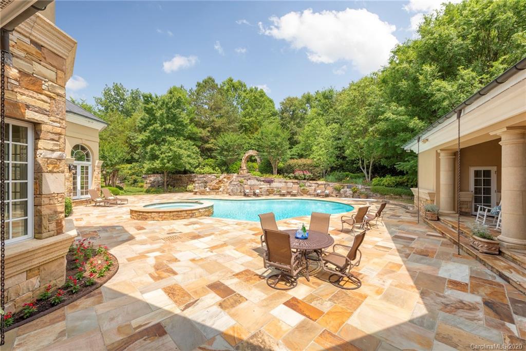8333 Providence Road Charlotte, NC 28277 - Photo 38 of 47 a view of a swimming pool with a patio