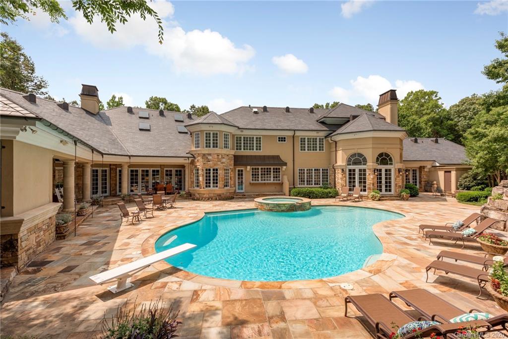 8333 Providence Road Charlotte, NC 28277 - Photo 39 of 47 a view of a house with swimming pool and sitting area
